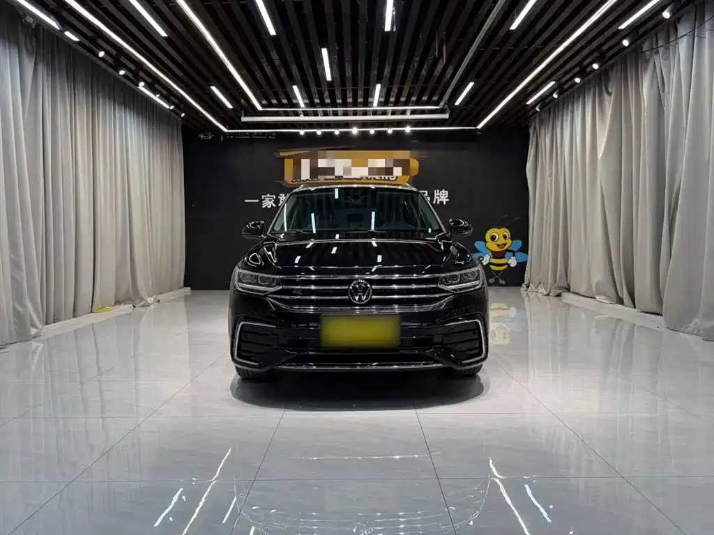 Volkswagen Tiguan L — фото 3