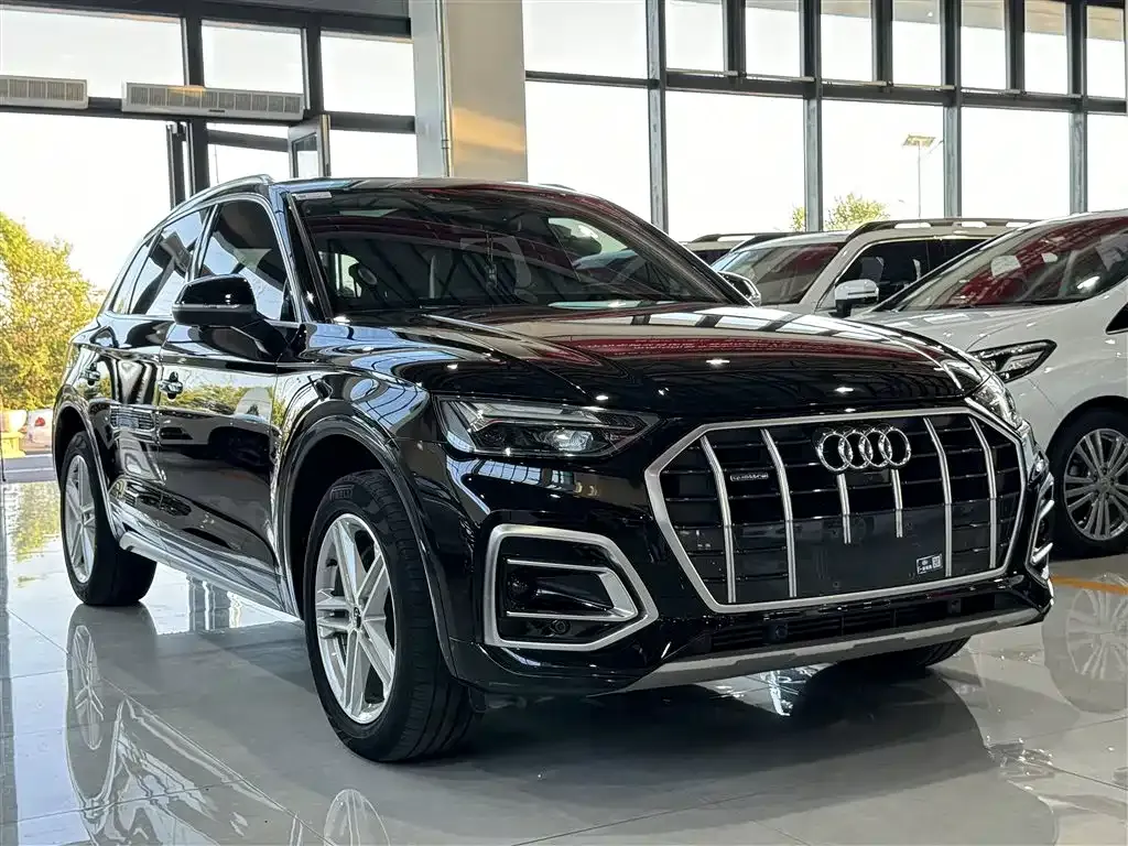 Audi Q5L — фото 8