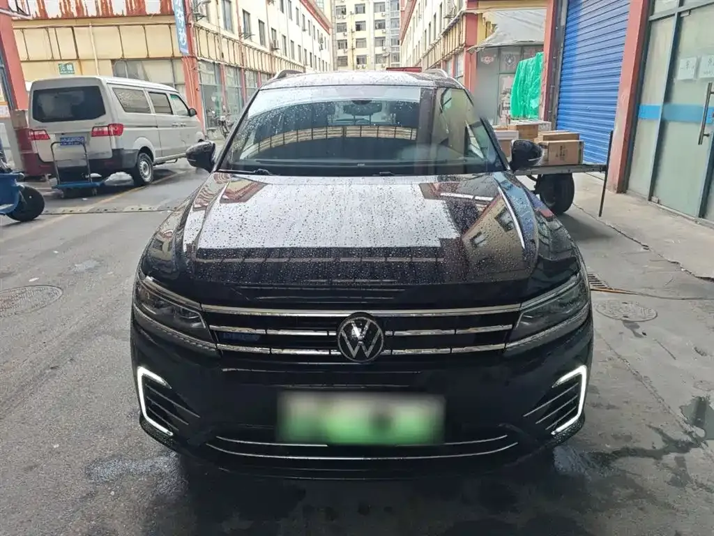 Volkswagen Tiguan L New Energy — фото 3