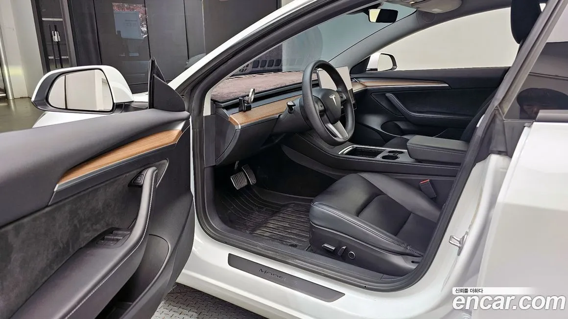 Tesla Model 3 — фото 10