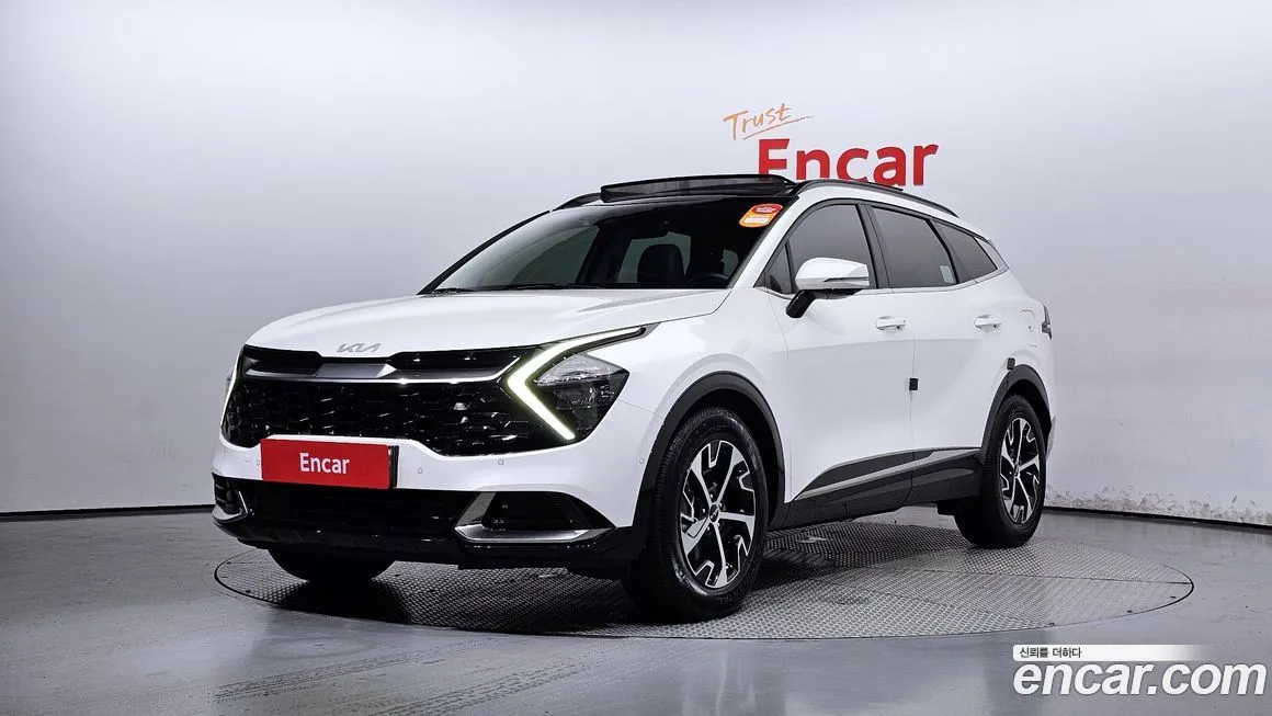 Kia Sportage — фото 1