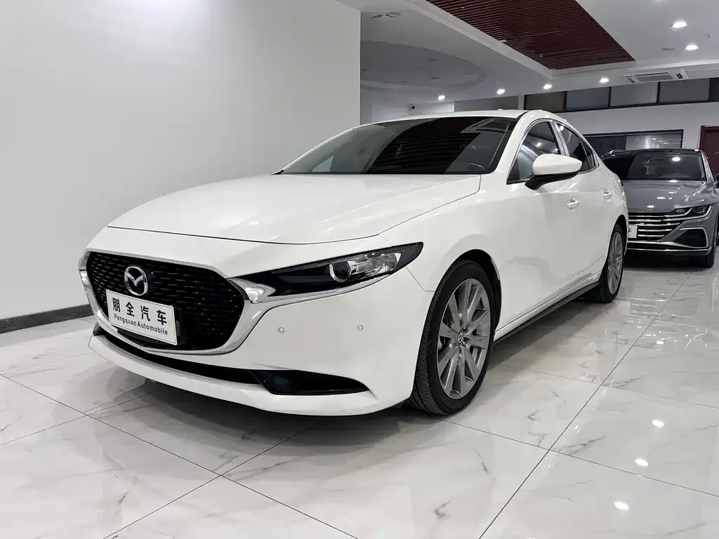 Mazda 3 Axela — фото 1