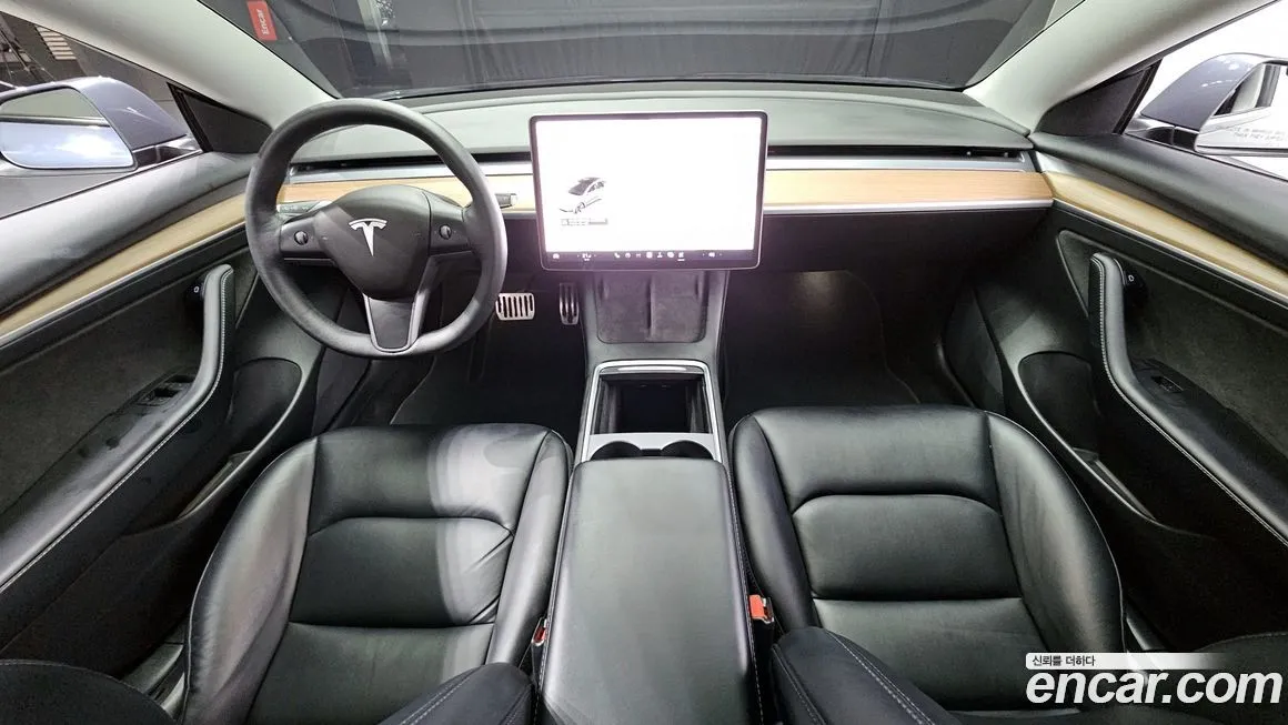 Tesla Model 3 — фото 7