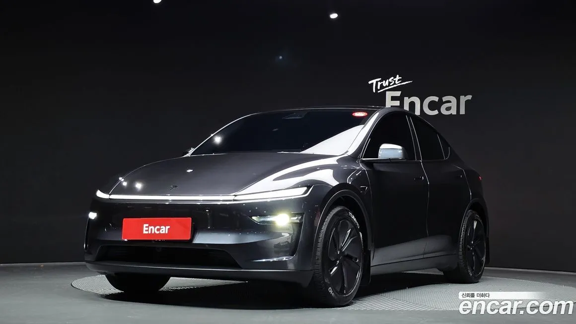 Tesla Model Y — фото 1