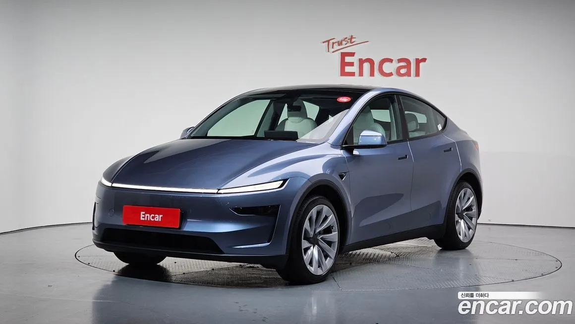 Tesla Model Y — фото 1