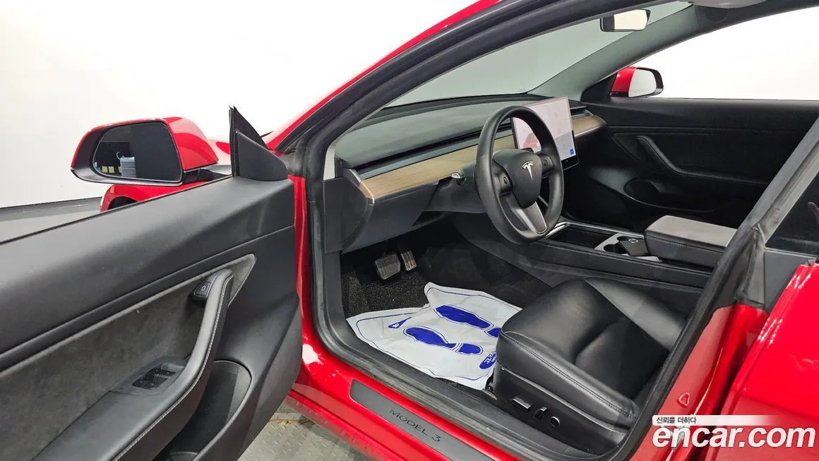 Tesla Model 3 — фото 10