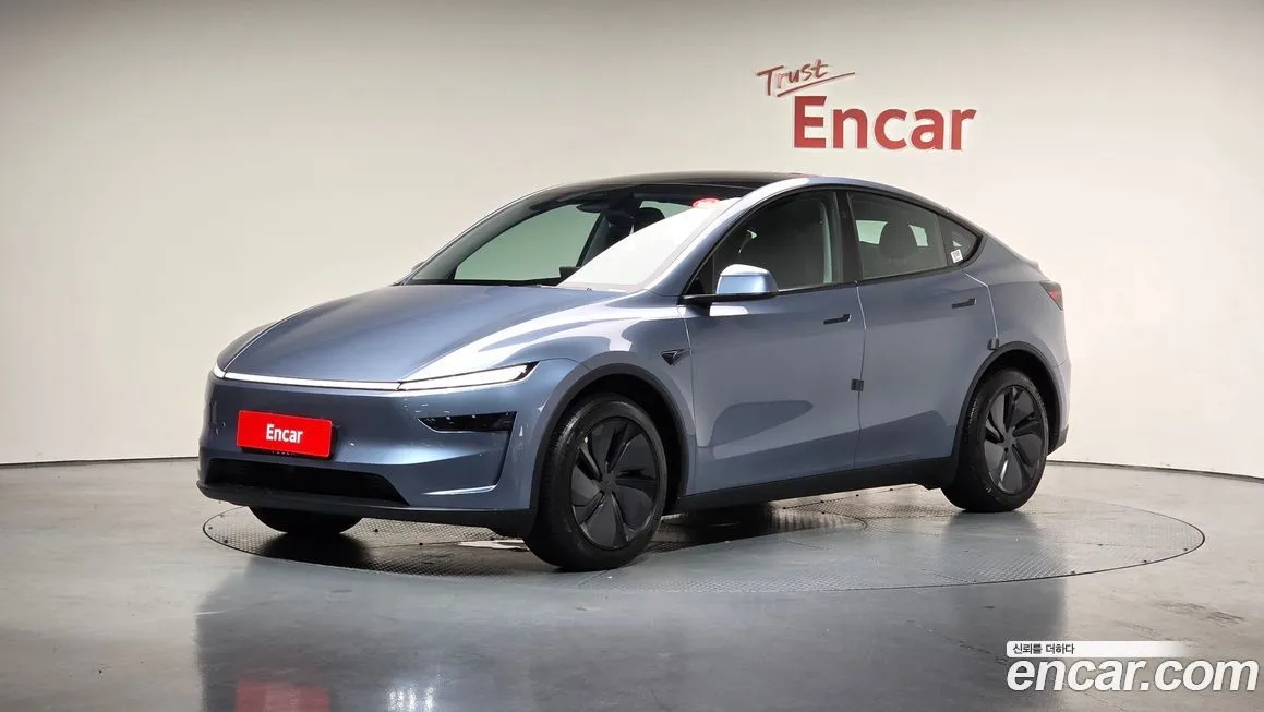 Tesla Model Y — фото 1