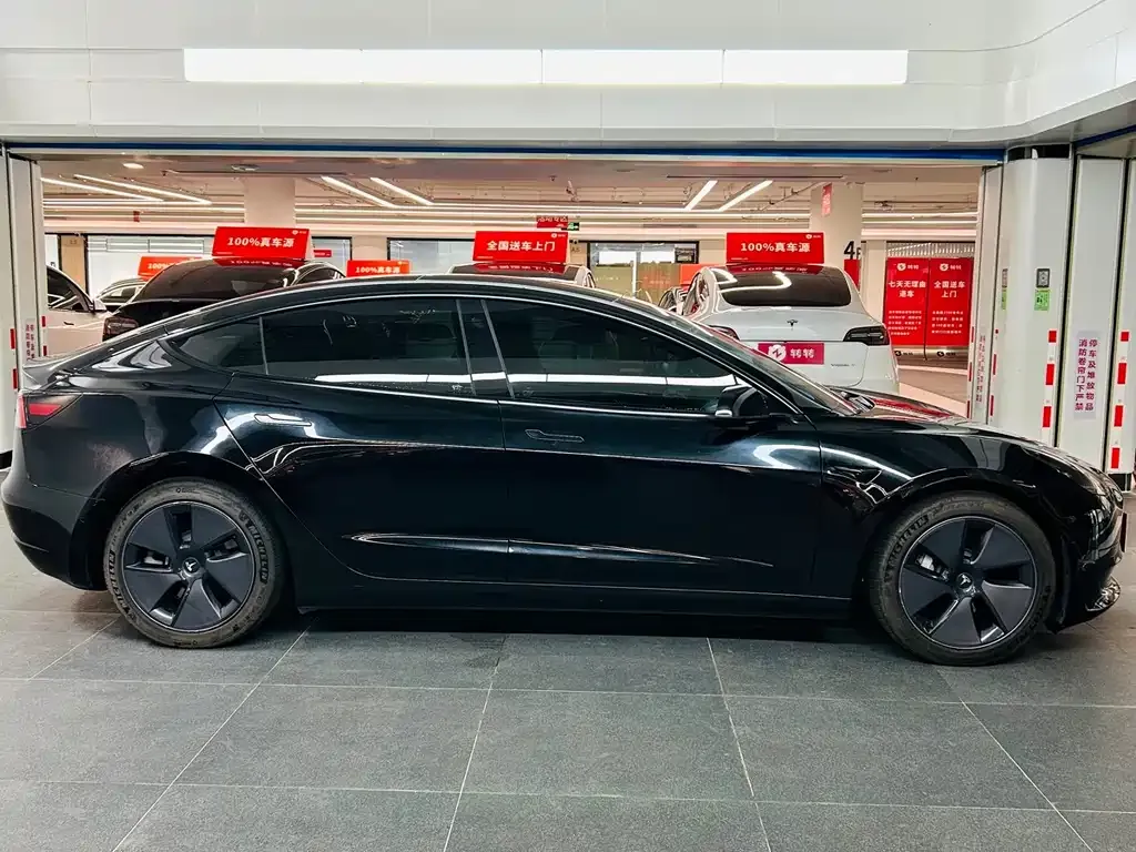Tesla Model 3 — фото 5