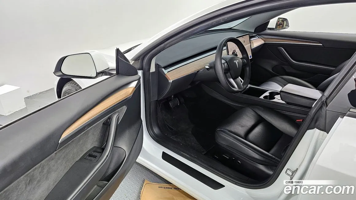Tesla Model 3 — фото 10