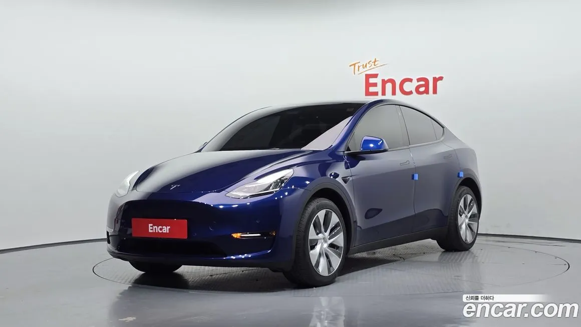Tesla Model Y — фото 1