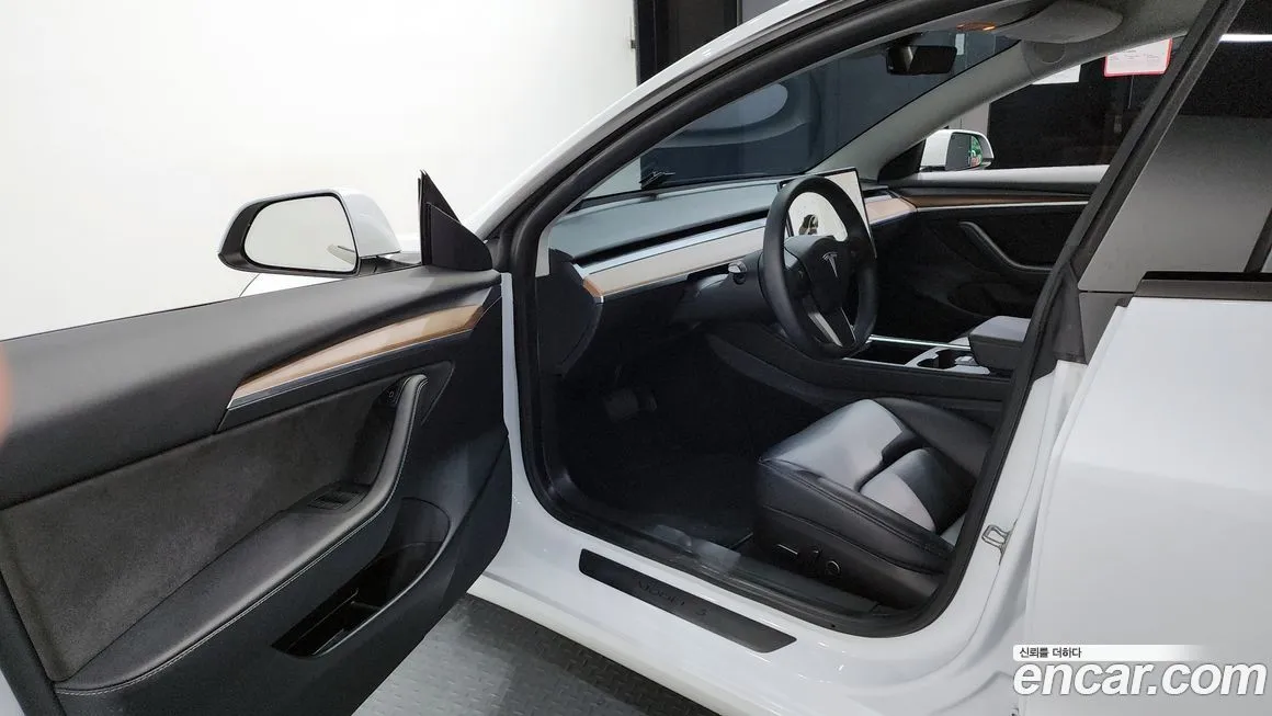Tesla Model 3 — фото 10