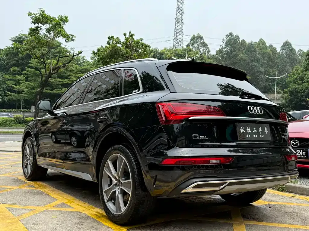 Audi Q5L — фото 6