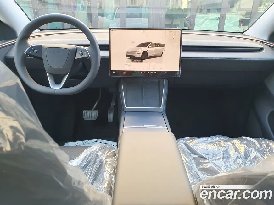 Tesla Model Y — фото 6