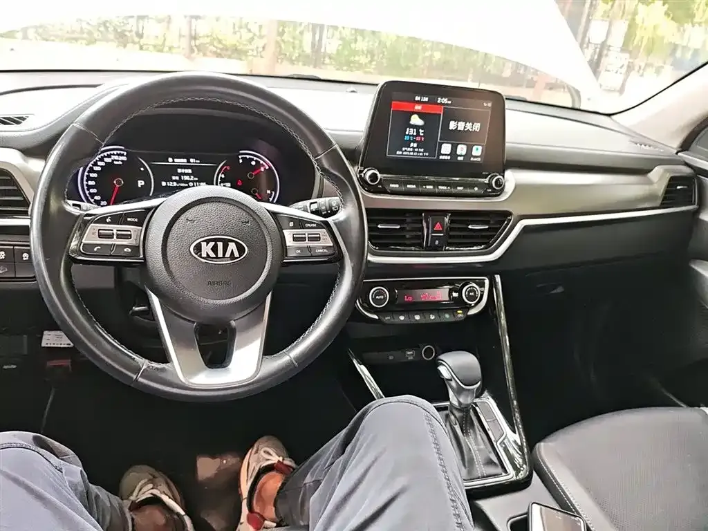 Kia Sportage — фото 10