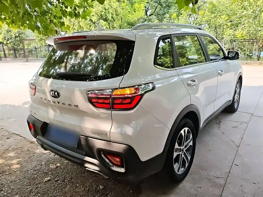 Kia Sportage — фото 7