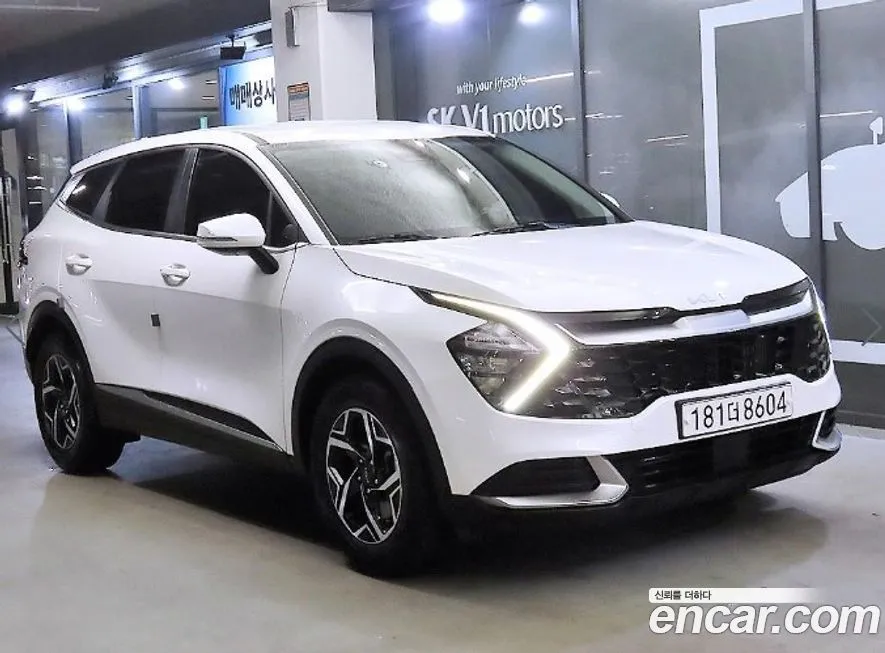 Kia Sportage — фото 1