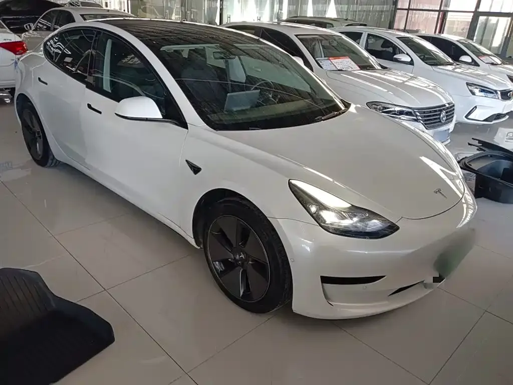 Tesla Model 3 — фото 4