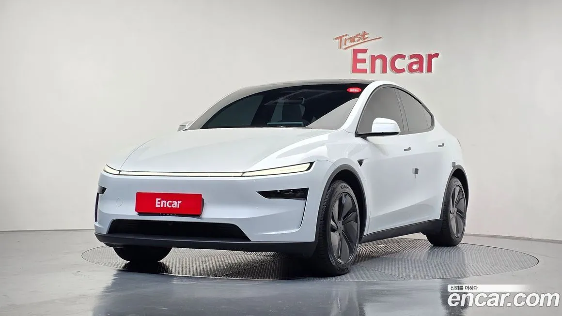 Tesla Model Y — фото 1
