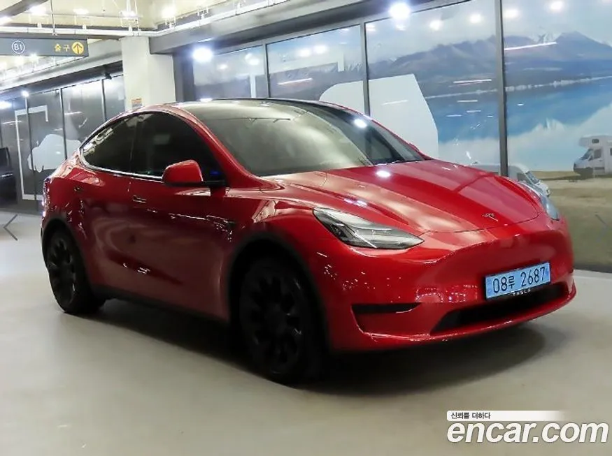 Tesla Model Y — фото 1