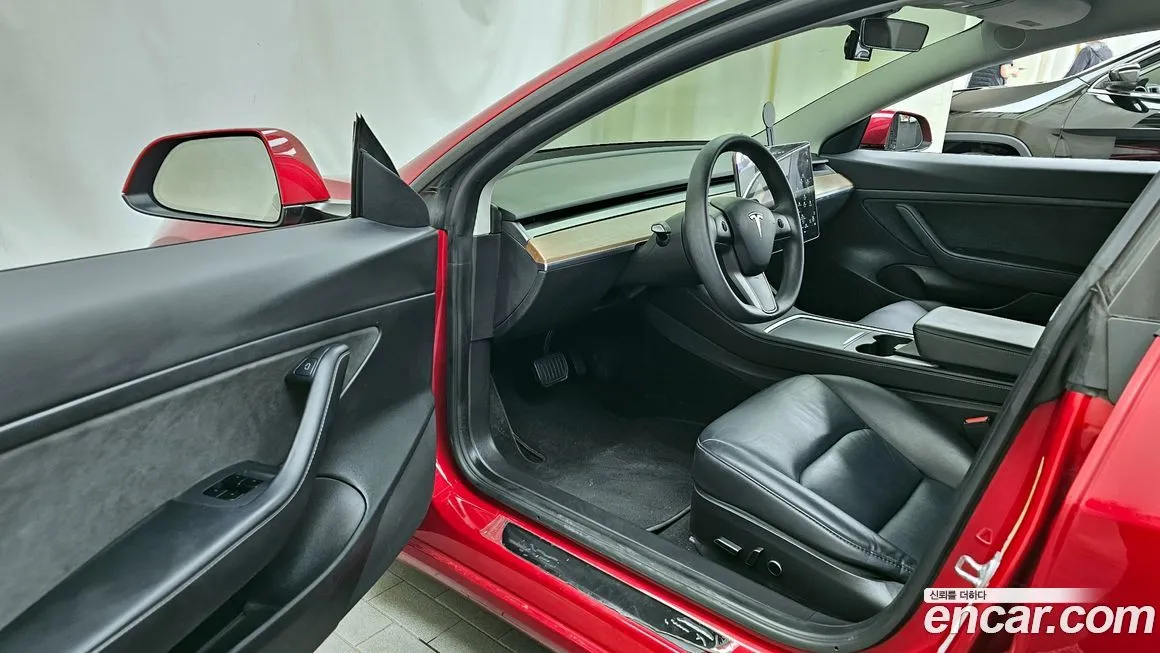Tesla Model 3 — фото 10