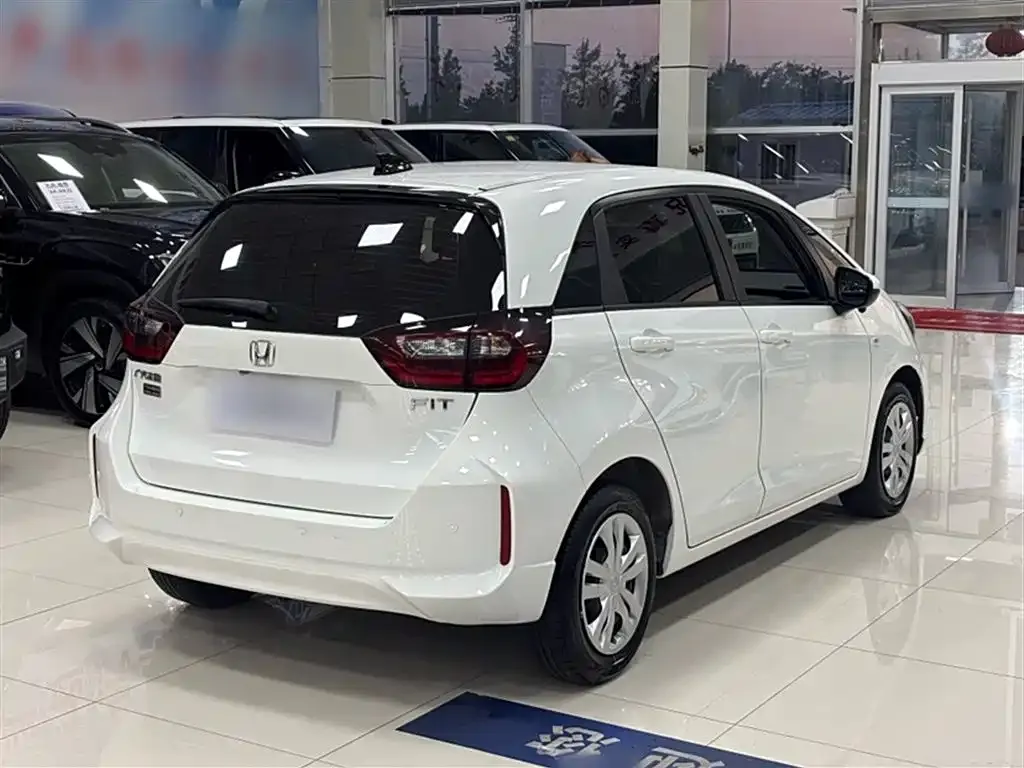 Honda Fit — фото 7