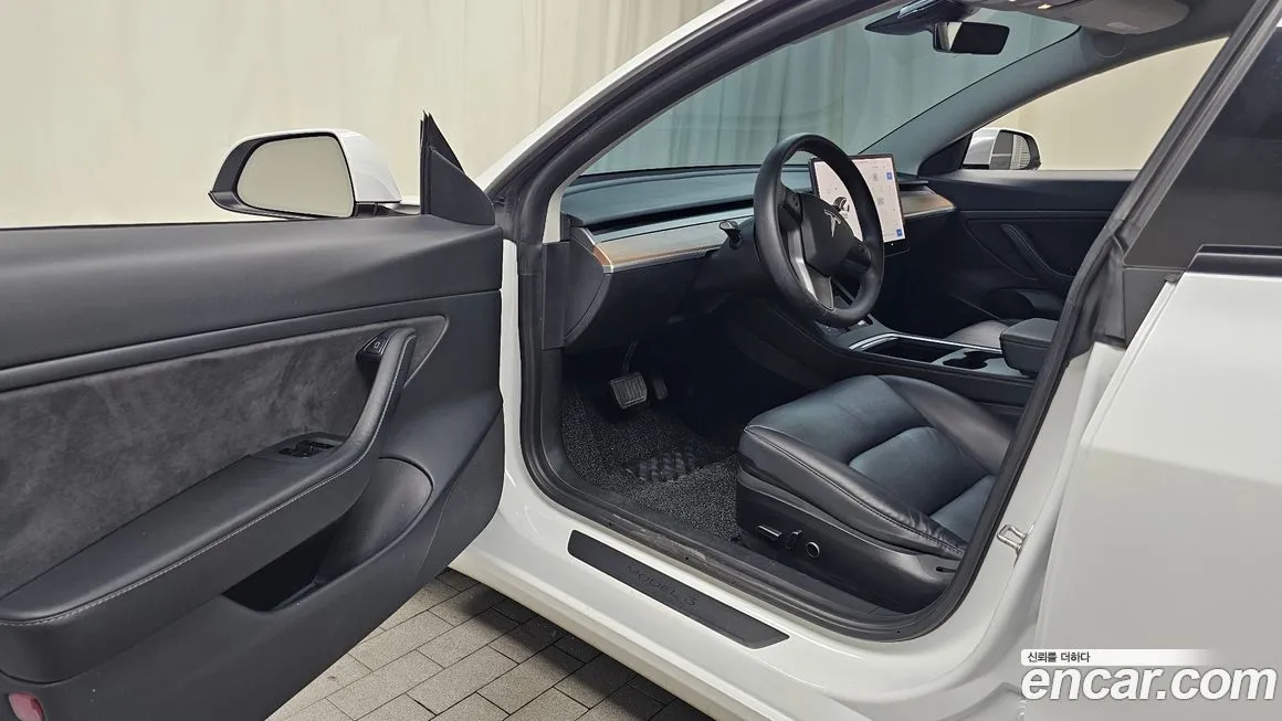 Tesla Model 3 — фото 10