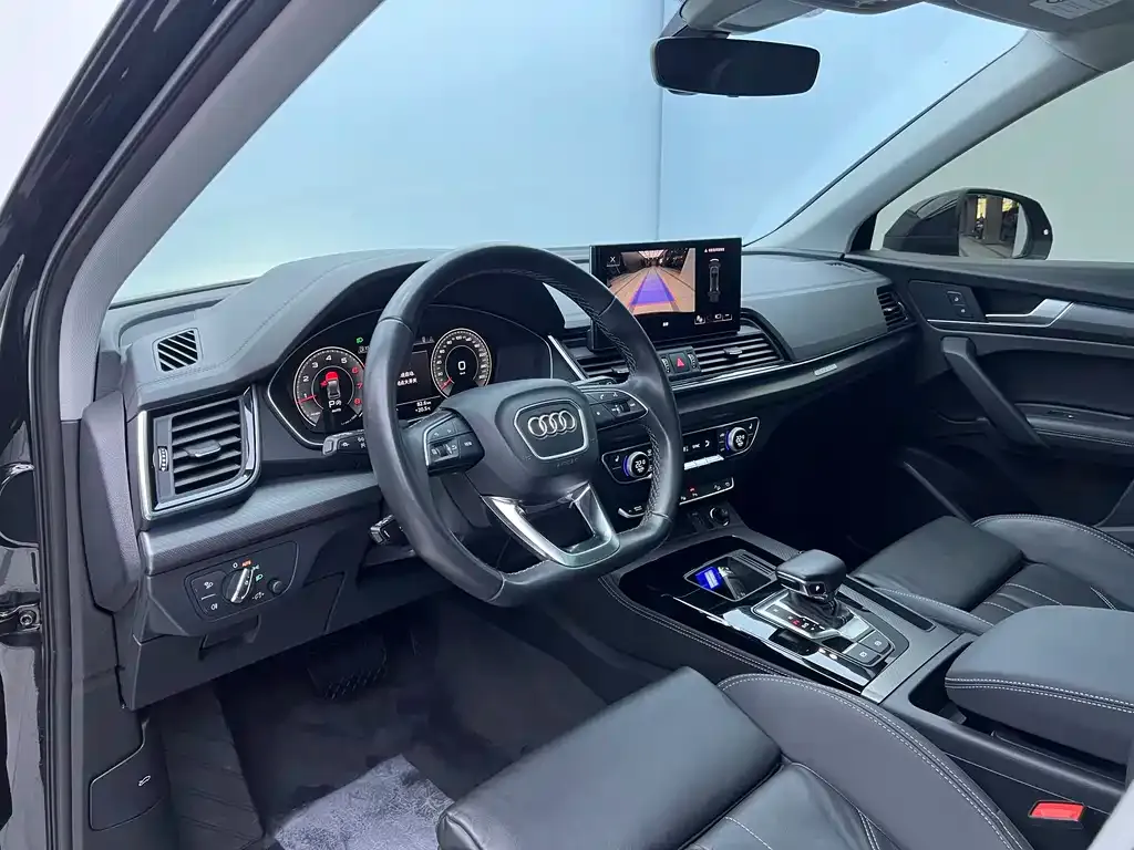 Audi Q5L — фото 10