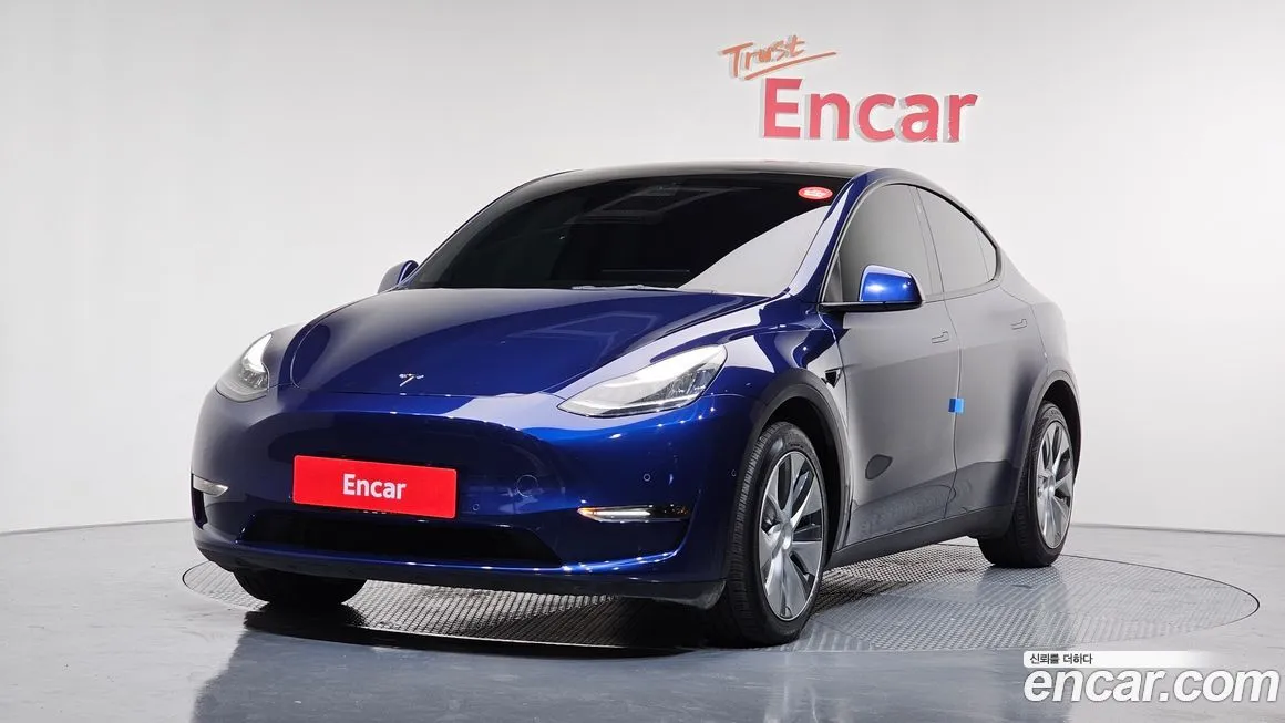 Tesla Model Y — фото 1