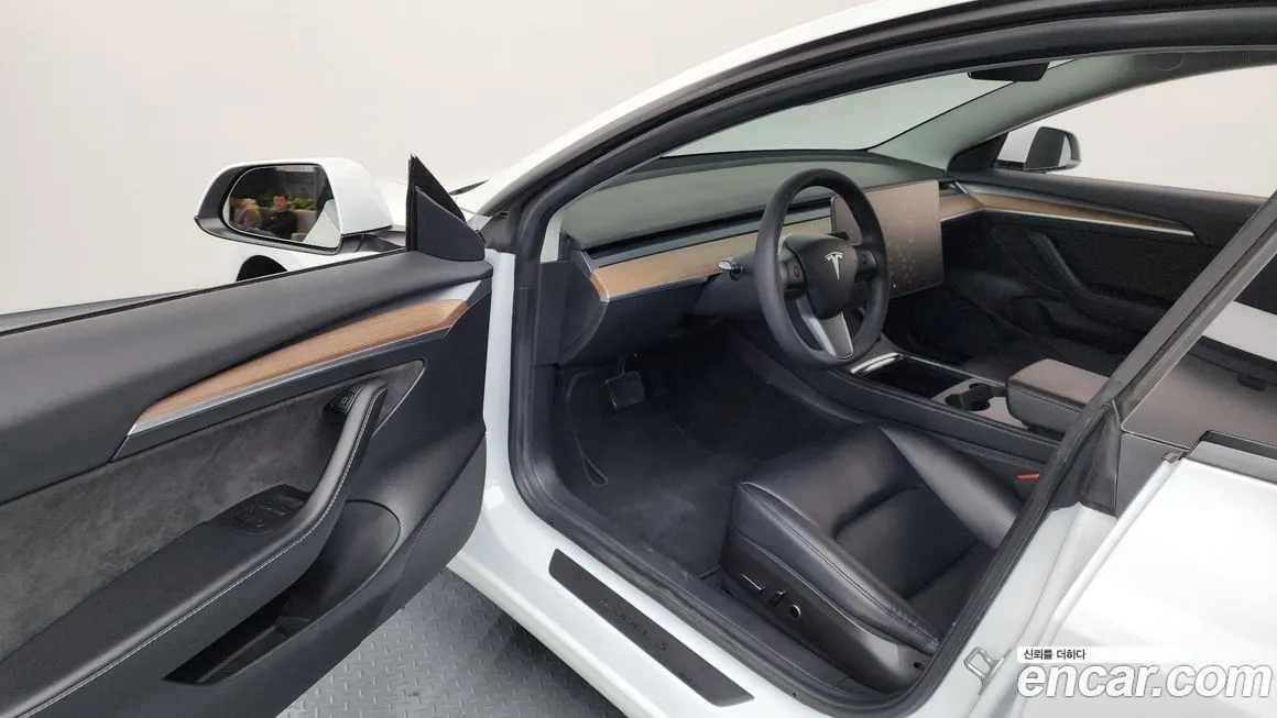Tesla Model 3 — фото 10