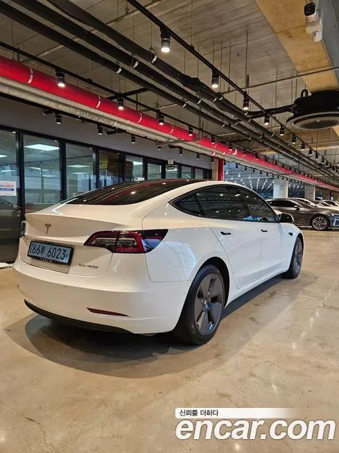Tesla Model 3 — фото 5