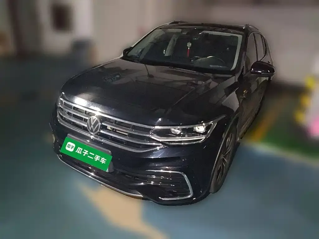 Volkswagen Tiguan L — фото 1