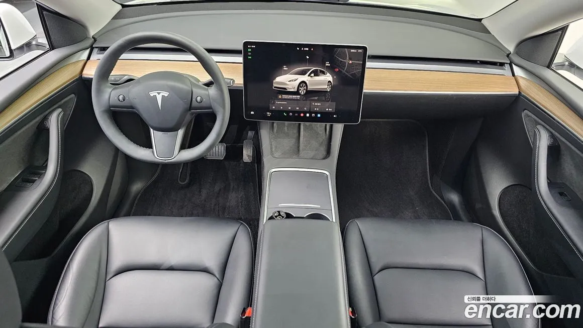 Tesla Model Y — фото 7