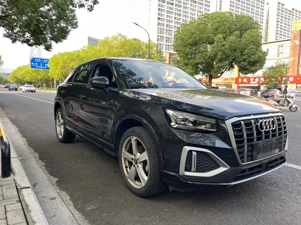Audi Q2L — фото 7