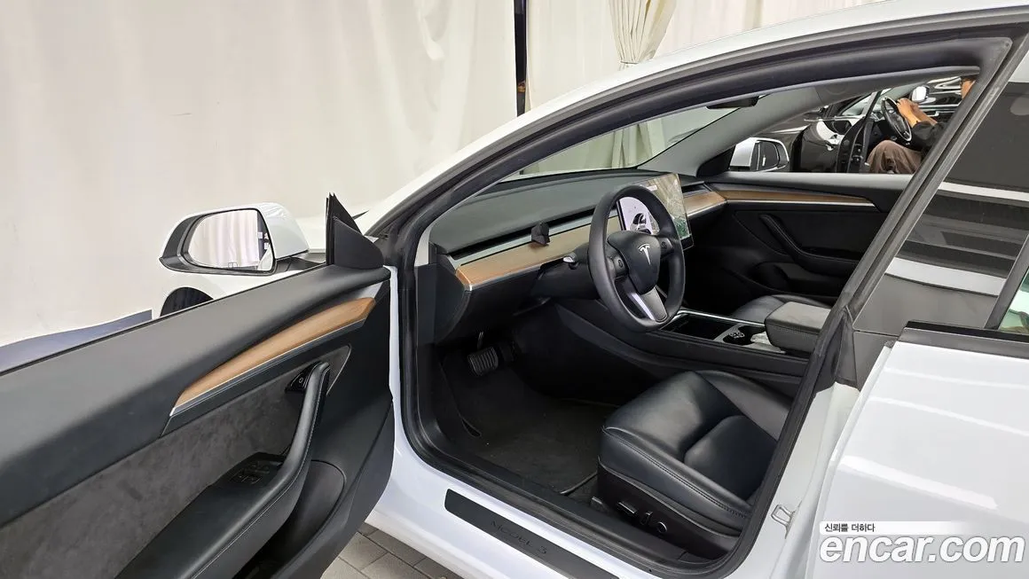 Tesla Model 3 — фото 10