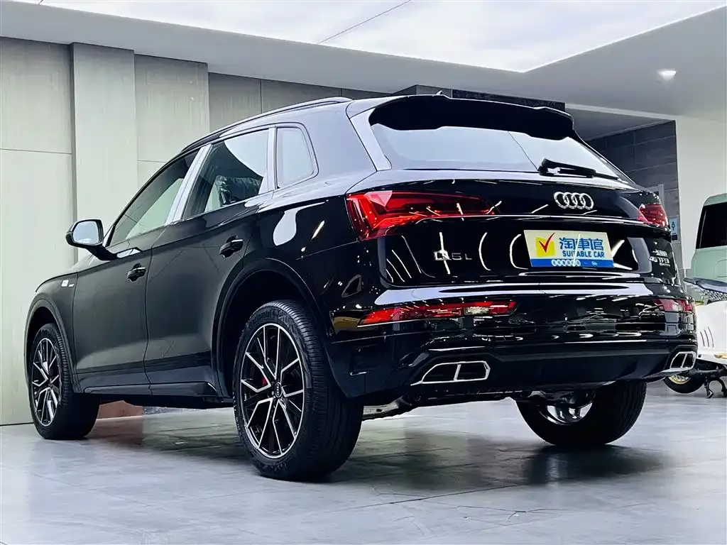 Audi Q5L — фото 6