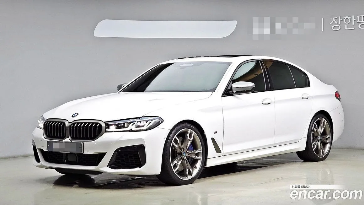 BMW 5-Series — фото 1