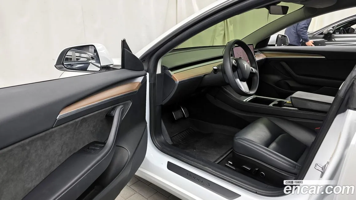 Tesla Model 3 — фото 10