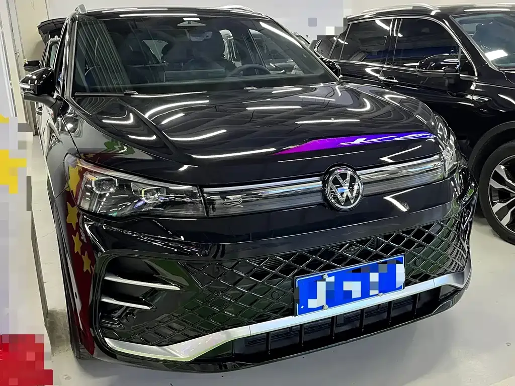 Volkswagen Tiguan L — фото 3