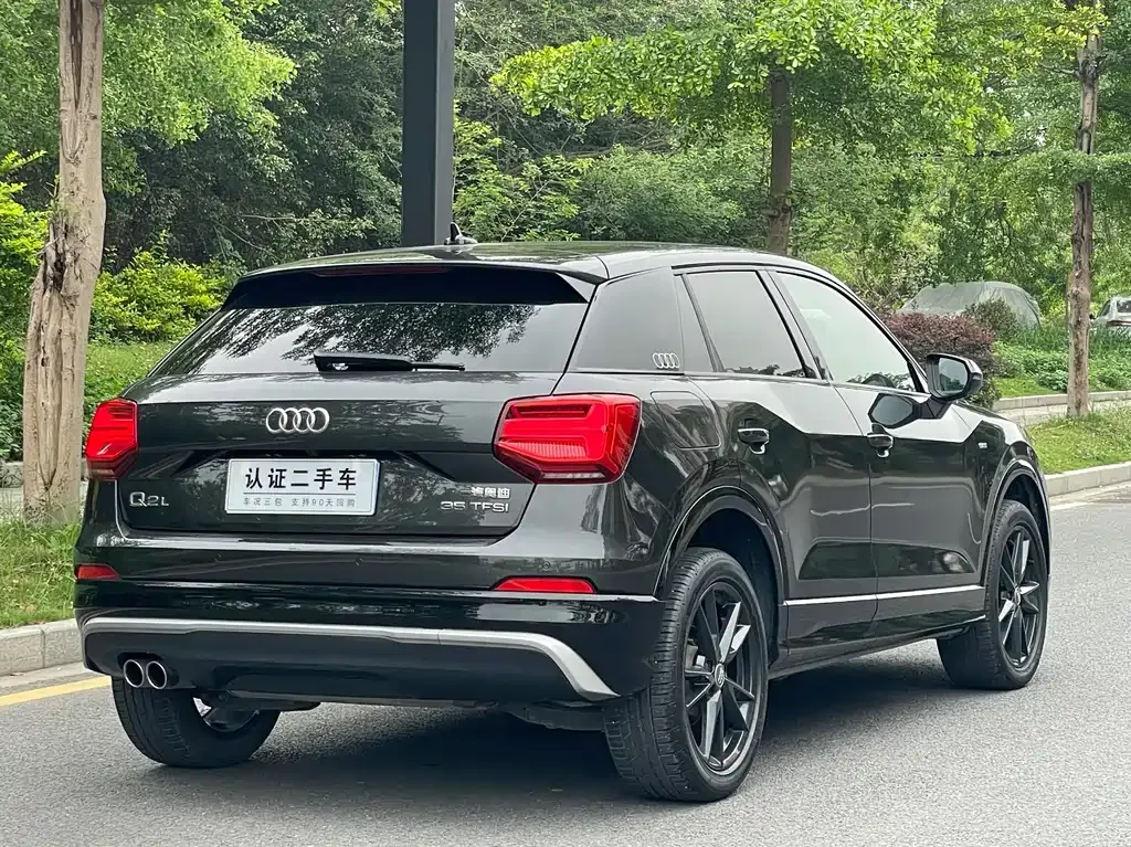 Audi Q2L — фото 7