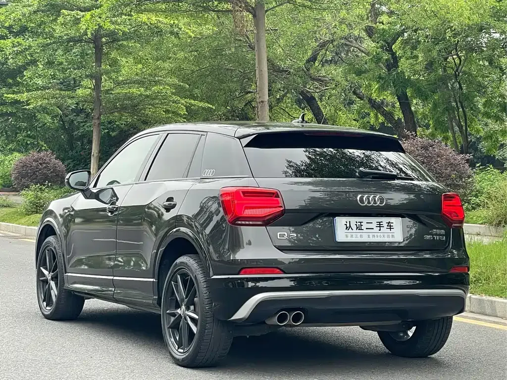 Audi Q2L — фото 9