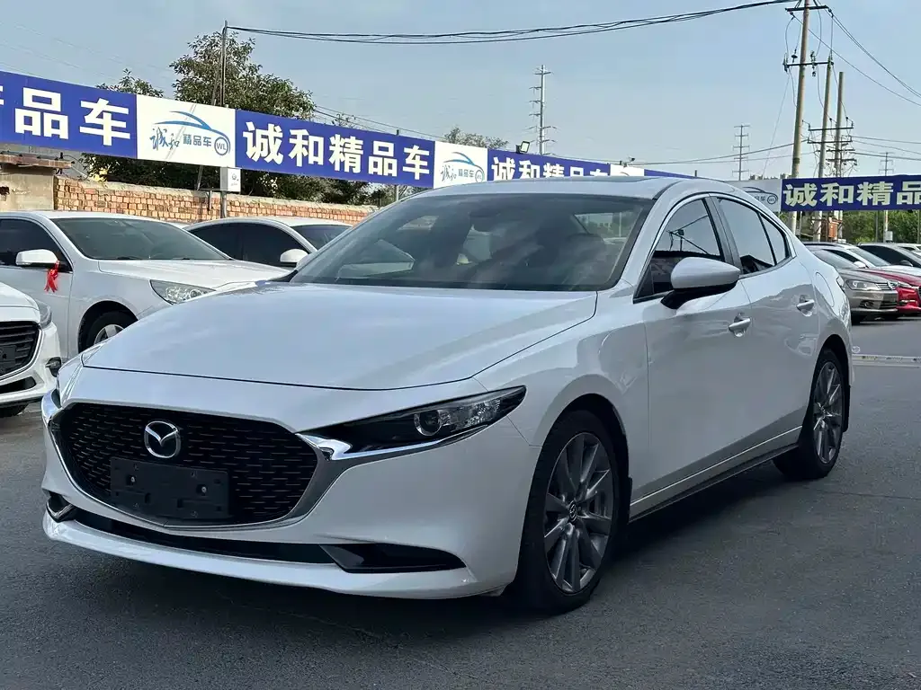 Mazda 3 Axela — фото 1
