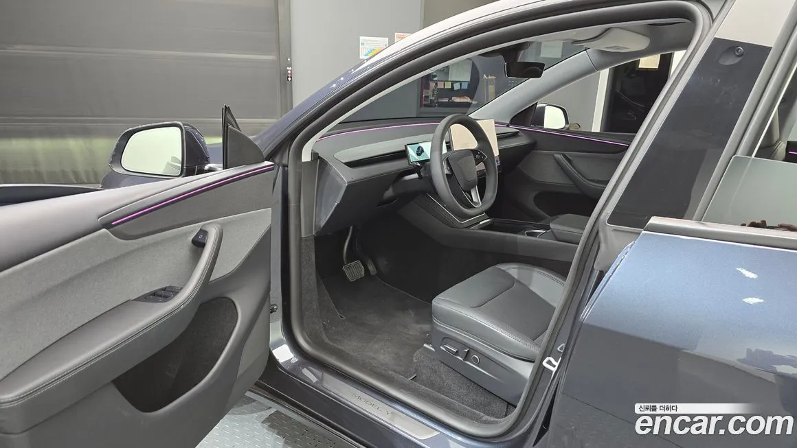 Tesla Model Y — фото 10