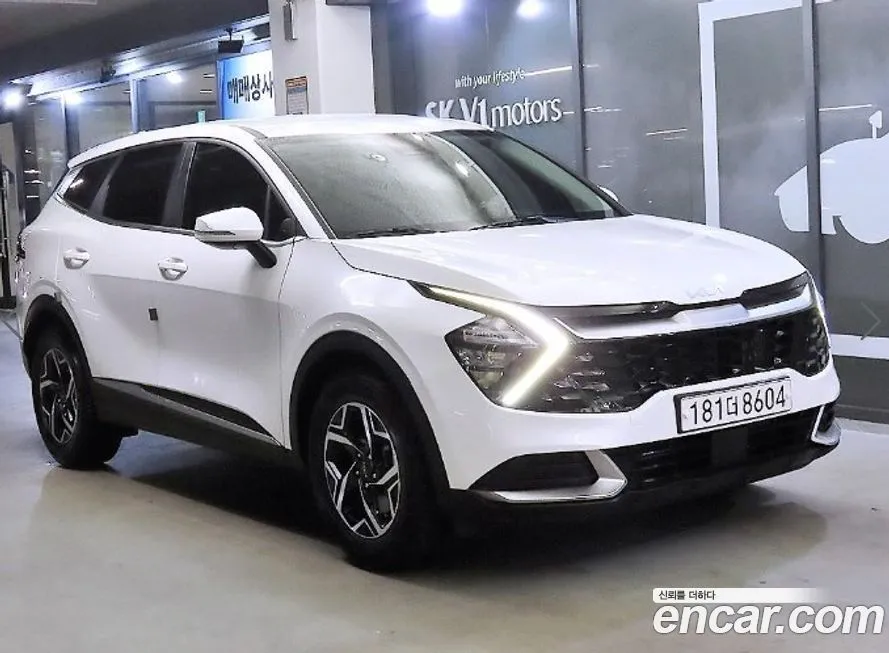 Kia Sportage — фото 1