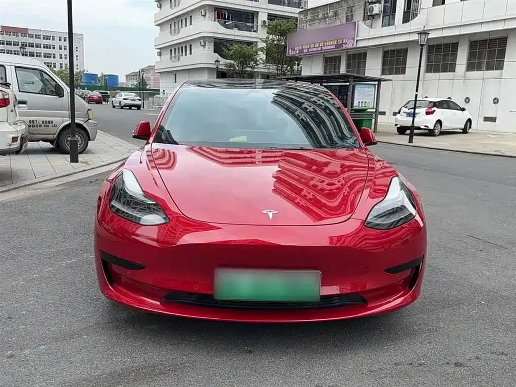 Tesla Model 3 — фото 7