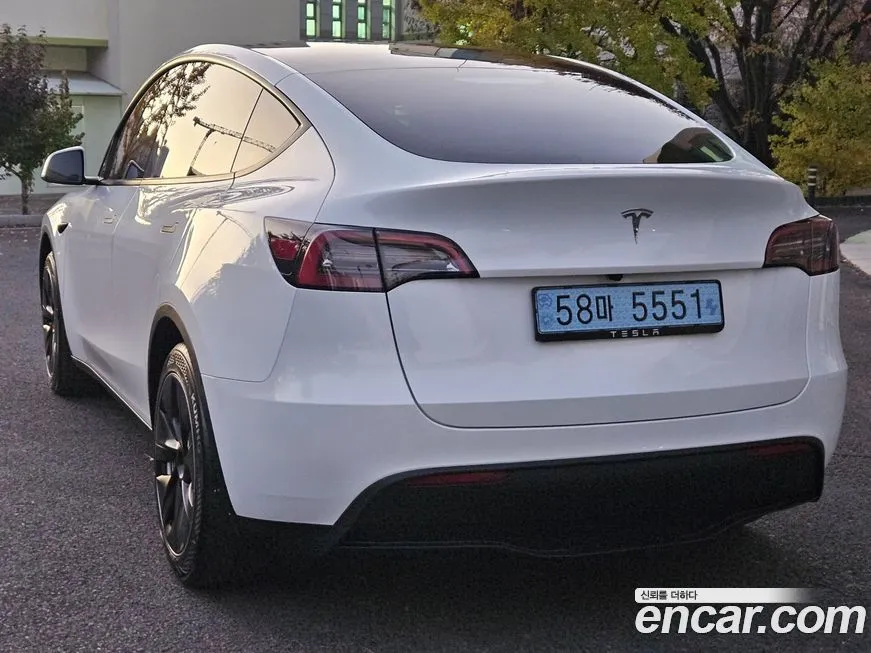 Tesla Model Y — фото 5