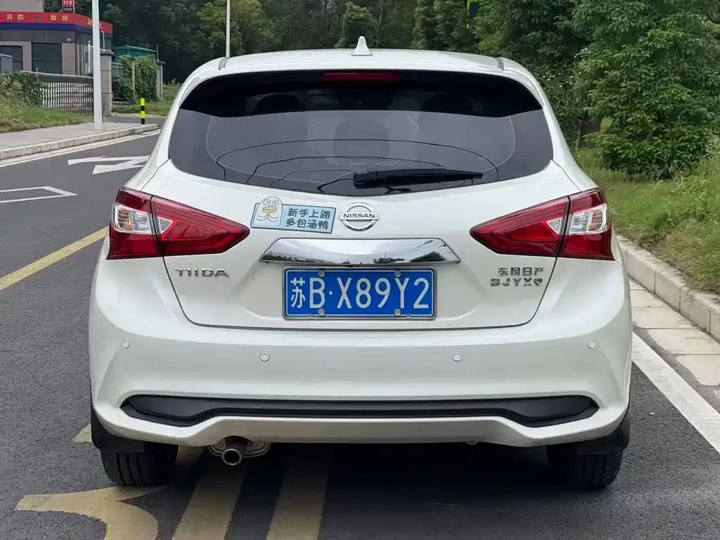 Nissan Tiida — фото 10