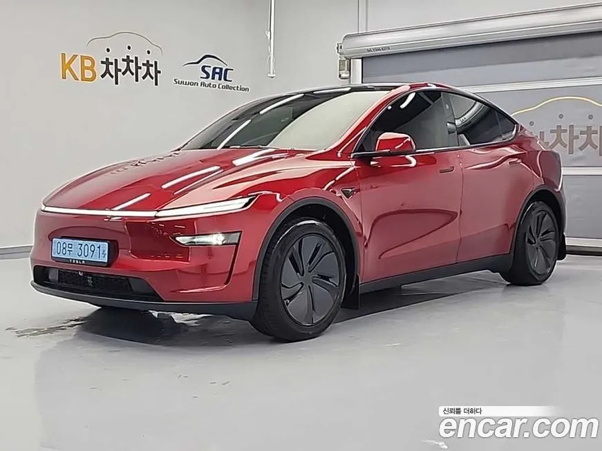 Tesla Model Y — фото 1