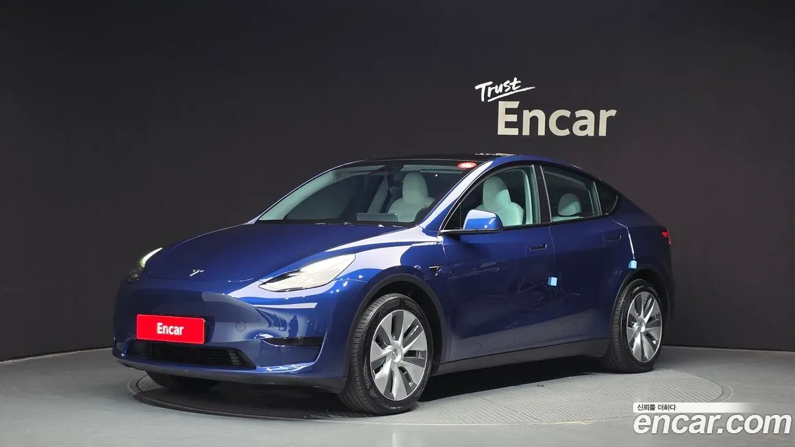 Tesla Model Y — фото 1