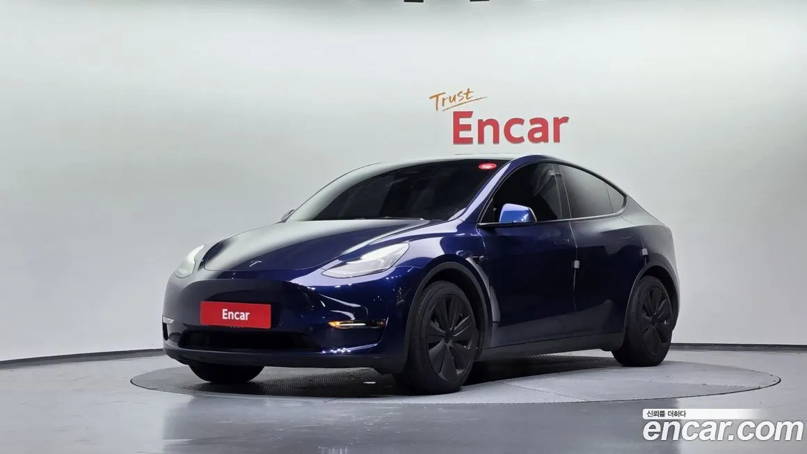 Tesla Model Y — фото 1