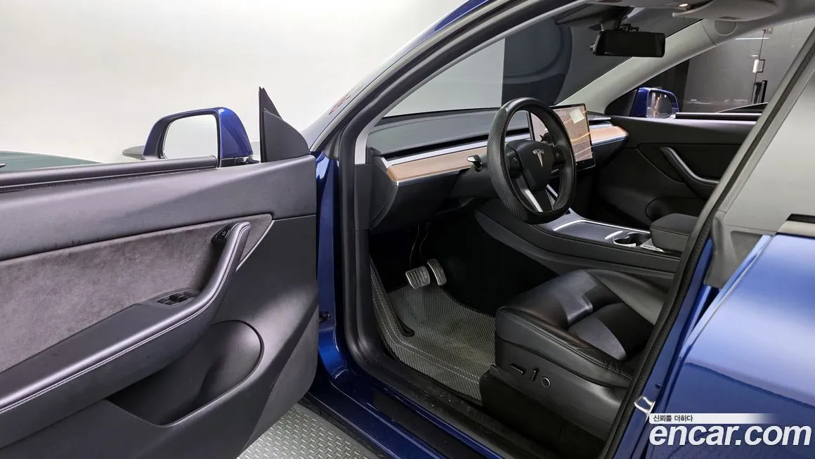 Tesla Model Y — фото 10